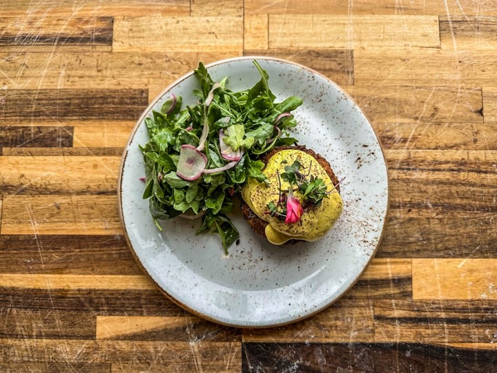 The Butcher's Daughter signature dishes Avocado Toast, Cauliflower Pizza, Spicy Kale Caesar